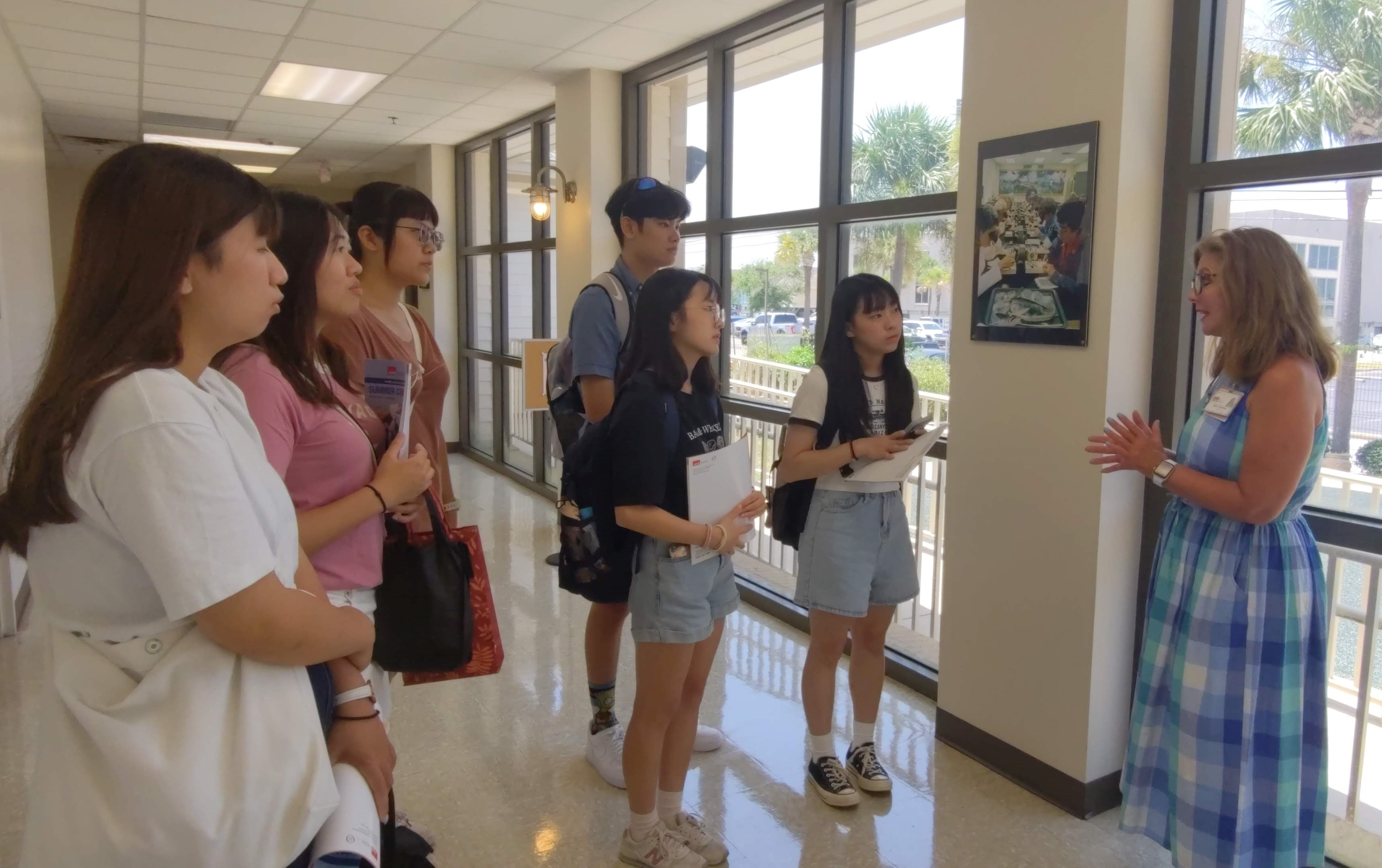 This image shows students from the Department of Healthcare Administration at Asia University, visiting the Lifelong Learning Institute in USA.