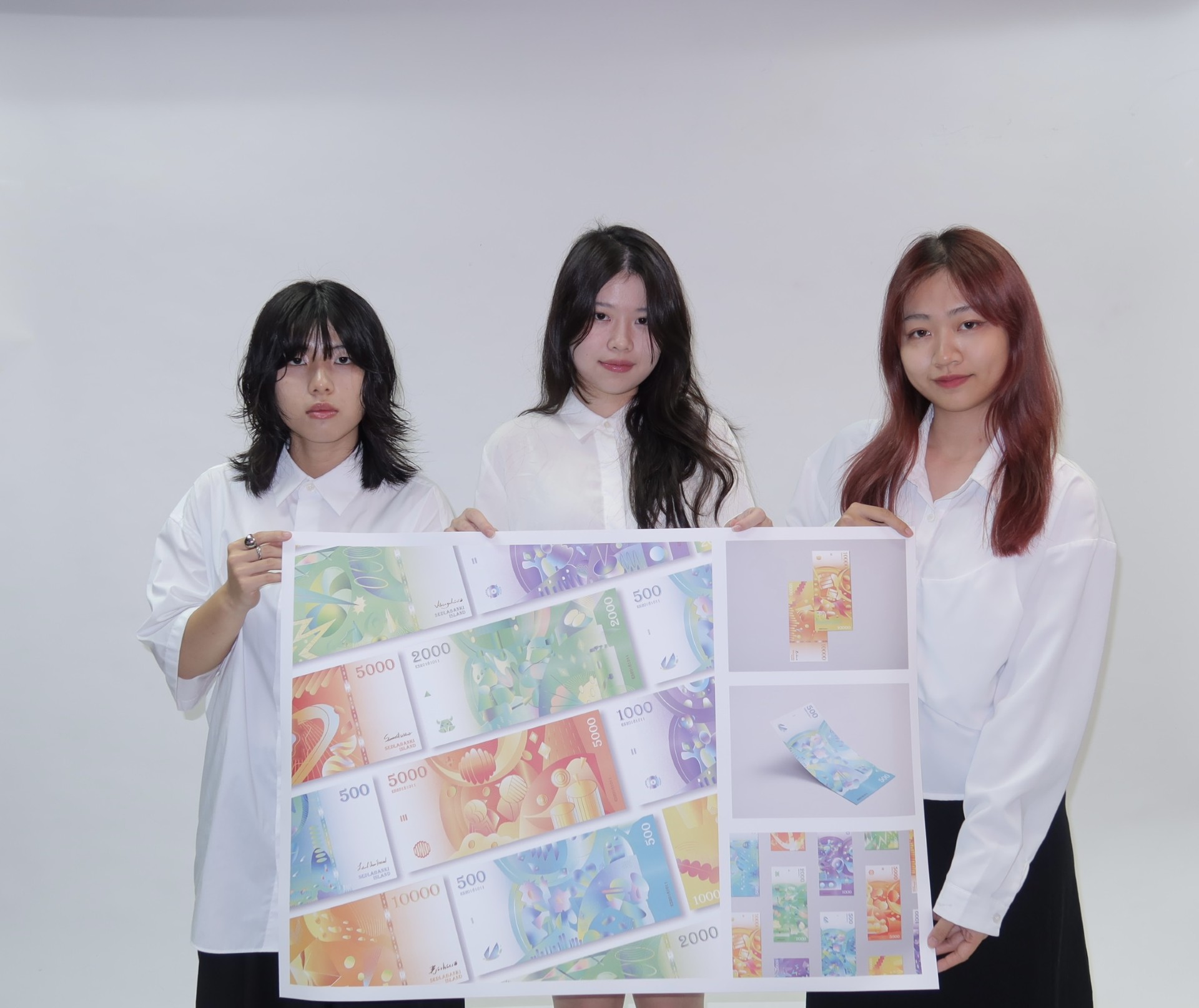 亞大數媒系郭佩雲、李佳甄、陳佳嫺同學,以「冰島節慶鈔票設計」作品獲「紅點獎」。