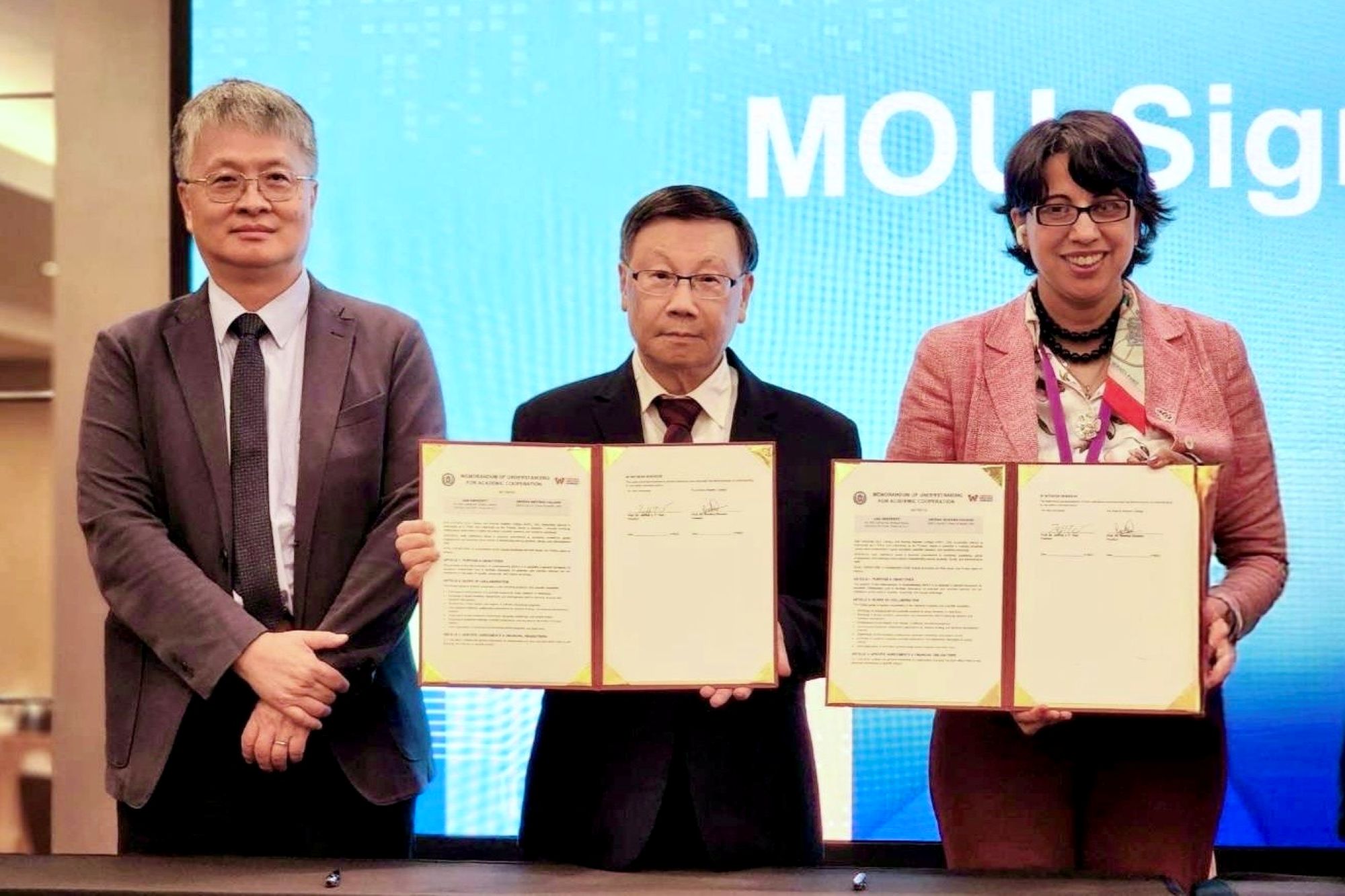 Taiwan Deputy Minister of Education Kuo-Wei Liu (left), Asia University President Jeffrey J. P. Tsai (center), and Arizona Western College President Dr. Reetika Dhawan pose for a photo following the signing of a Memorandum of Understanding